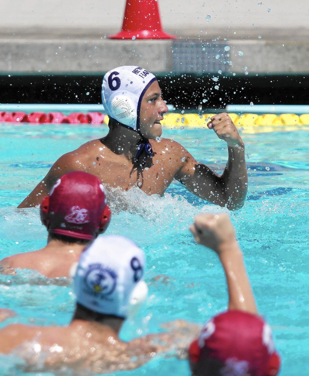 Tommaso Baldineti (6) of Newport Beach Water Polo reacts after evening the score, 6-6, during the fourth period against the Trojan Water Polo Cardinal team in the USA Junior Olympics 14U boys' bronze match at the William Woollett Aquatic Center in Irvine on Tuesday.