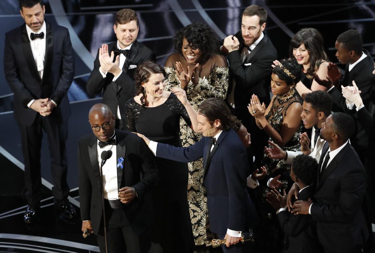 "Moonlight" writer-director Barry Jenkins accepts the award for best picture after a mix-up in announcing the winner.