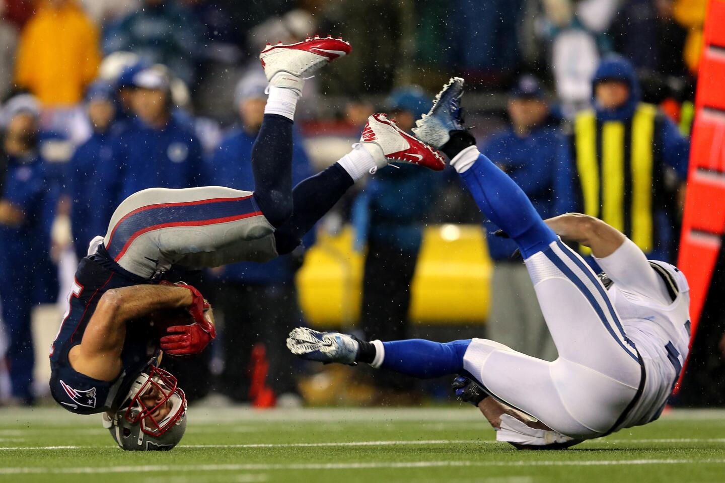 Julian Edelman, LaRon Landry