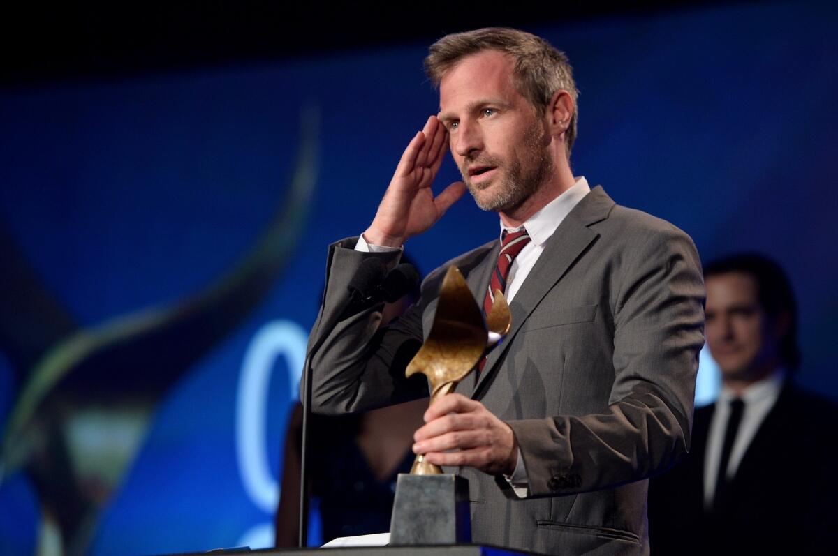 Spike Jonze accepts the award for original screenplay for "Her" at the Writers Guild of America, West ceremony on Saturday night in Los Angeles.