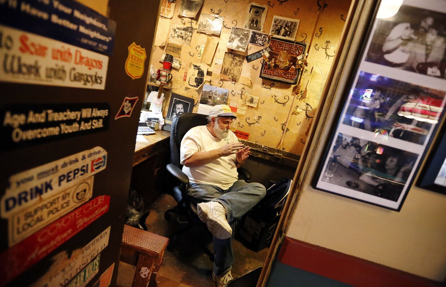 Kenny Reed, a UC San Diego sociology graduate and owner of Guthrie's Alley Cat Bar in downtown Bakersfield, sits in his office while discussing his progressive political ideals and how they relate to Donald Trump.
