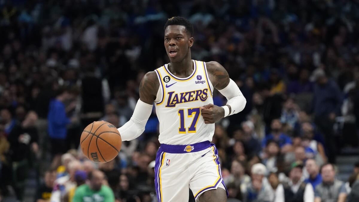 Los Angeles Lakers guard Dennis Schroder controls the ball against the Dallas Mavericks on Sunday.
