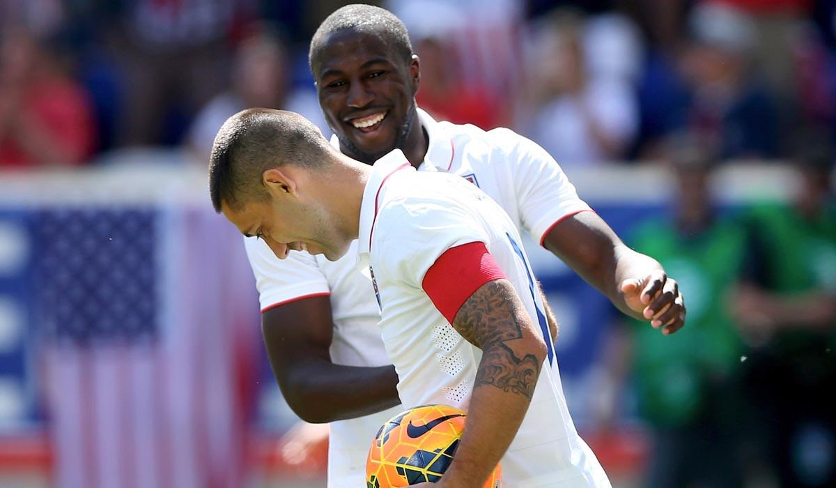 U.S. midfielder Clint Dempsey takes a bow as he's congratulated by teammate Jozy Altidore after scoring what proved to be the winning goal against Turkey in a World Cup warmup game on Sunday.