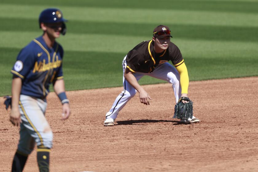 PEORIA, AZ - MARCH 03: San Diego Padres Ha-seong Kim played third base against the Milwaukee Brewers on Wednesday, March 3, 2021 in Peoria, AZ. (K.C. Alfred / The San Diego Union-Tribune)
