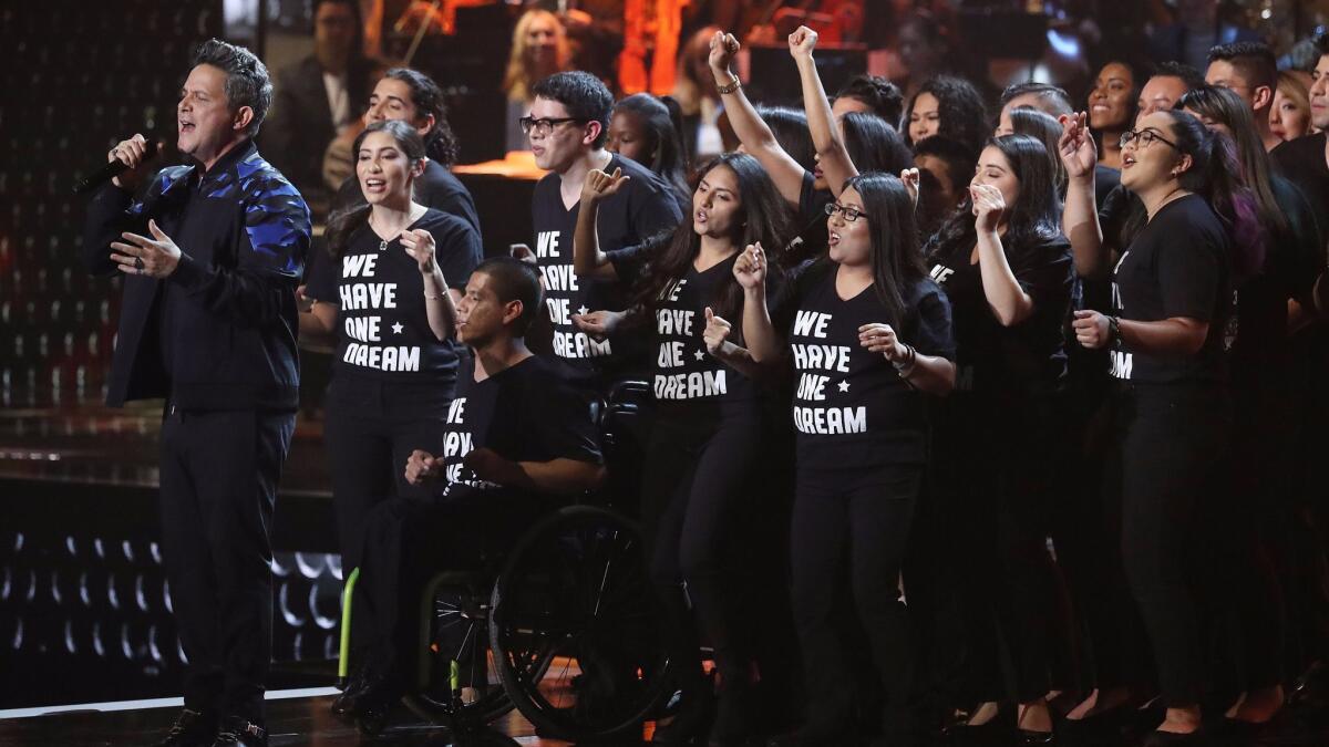 Alejandro Sanz, the Latin Recording Academy's Person of the Year, performs his hit "Corazón Partío" with a chorus of DACA recipients at the Latin Grammy Awards in Las Vegas on Nov. 16.