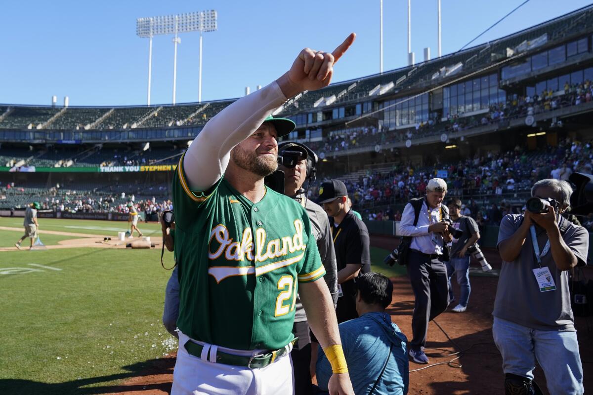 Oakland Athletics' Stephen Vogt exits the field after the team's 3-2 victory over the Los Angeles Angels in a baseball game in Oakland, Calif., Wednesday, Oct. 5, 2022. (AP Photo/Godofredo A. Vásquez)