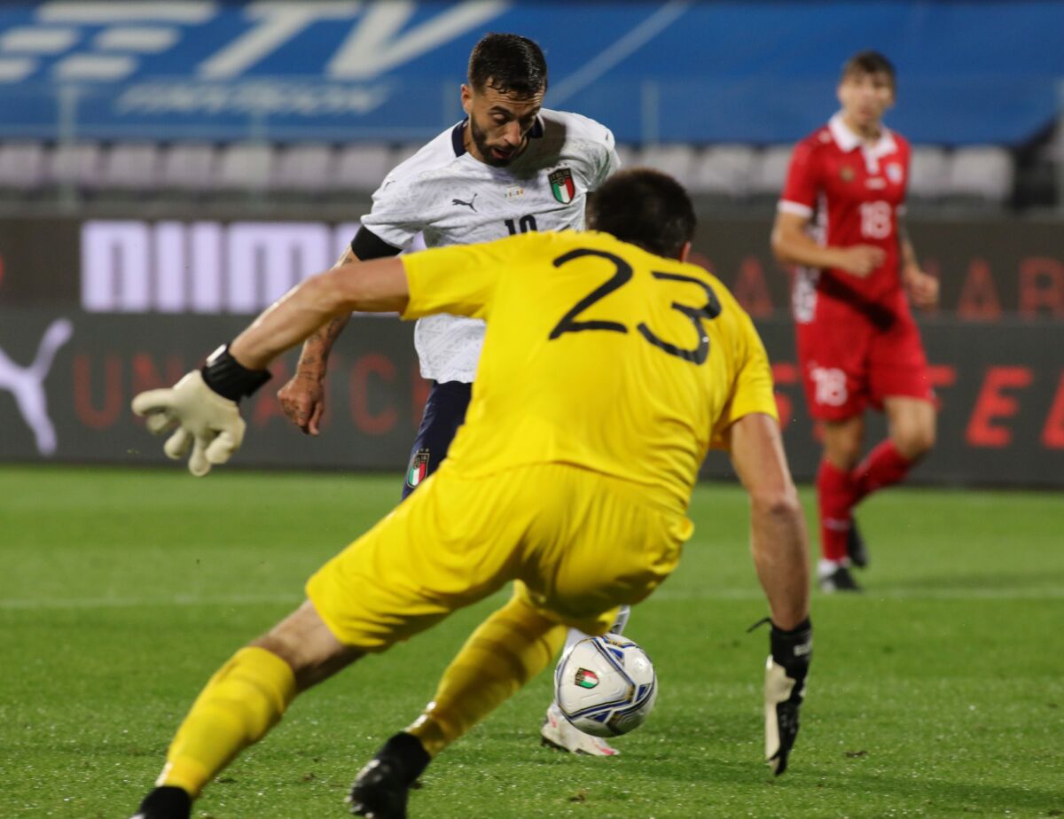 Italy's Francesco Caputo scores a goal during the international friendly soccer match between Italy and Moldova, at the Artemio Franchi stadium, in Florence, Italy, Wednesday, Oct. 7, 2020. (Marco Bucco/LaPresse via AP)