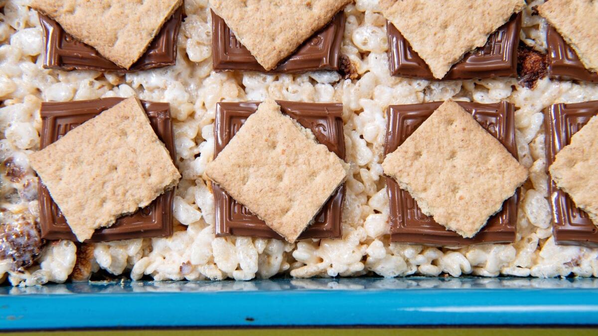 Campfire marshmallow bars are tasty on their own and even more indulgent with melty milk chocolate and crunchy graham crackers.