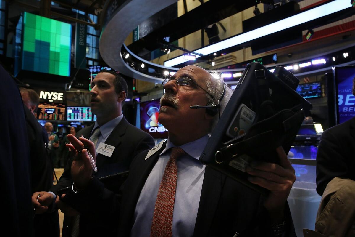 The stock market rose fractionally Monday following its record-setting run last week.