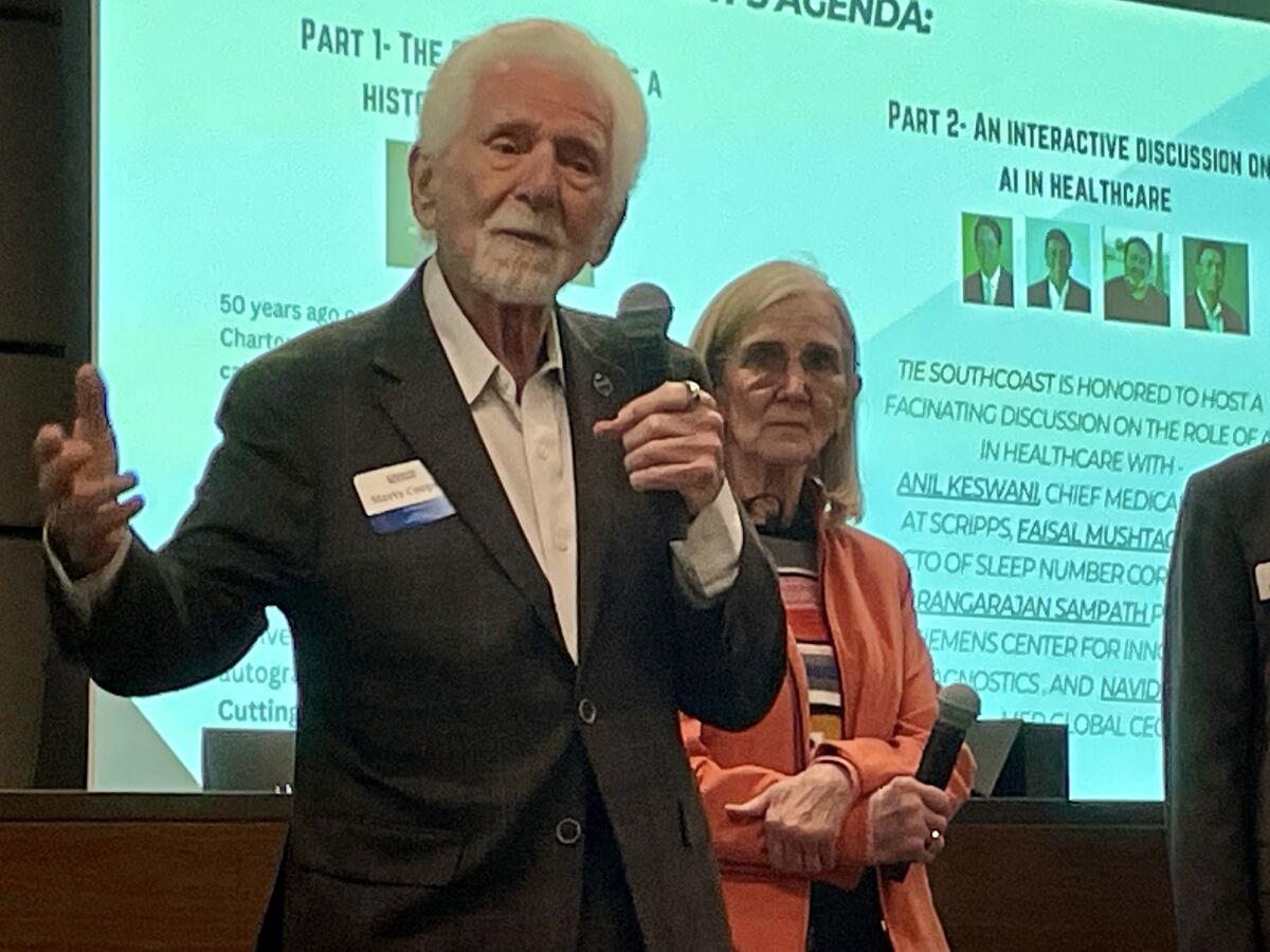 Marty Cooper, with his wife Arlene Harris