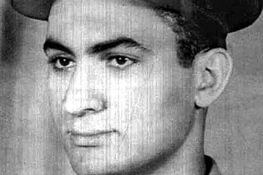 An image of Hosni Mubarak shows him as a young Royal Egyptian Air Force Lieutenant before the revolution that deposed King Farouk in 1952. Mubarak rose through the Air Force ranks.