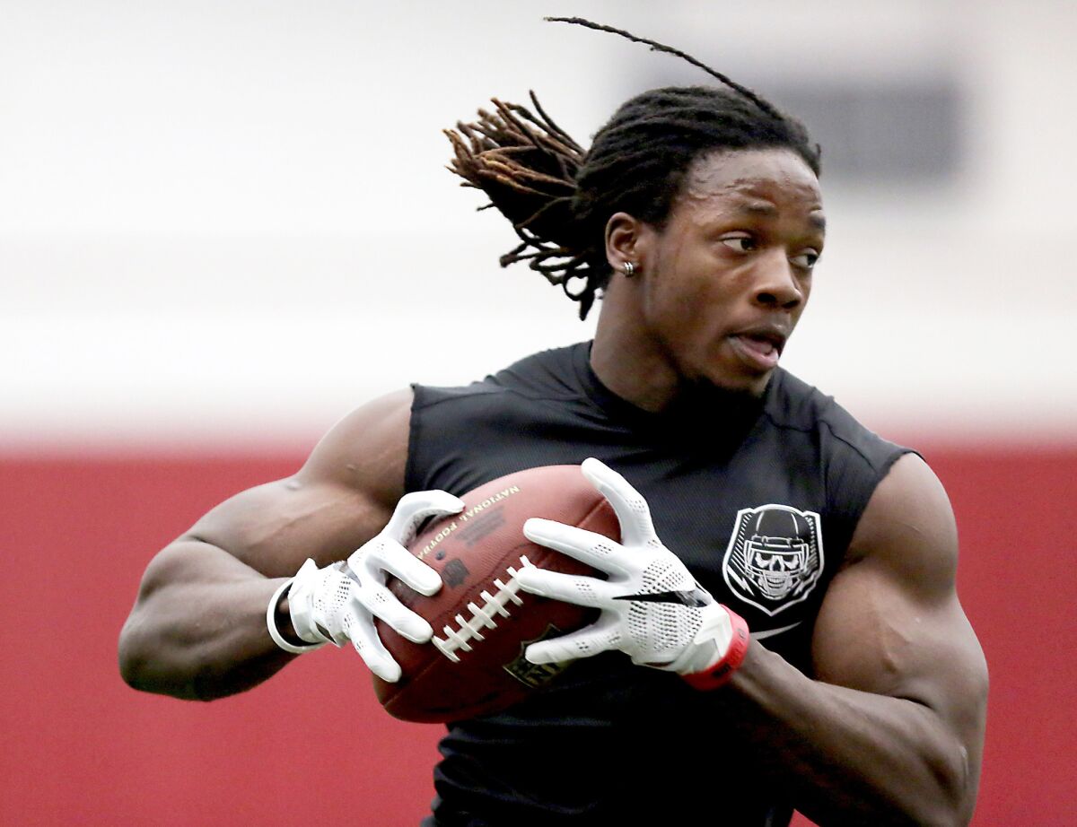 Wisconsin running back Melvin Gordon runs a receiving drill during the Badgers' pro day on March 11.