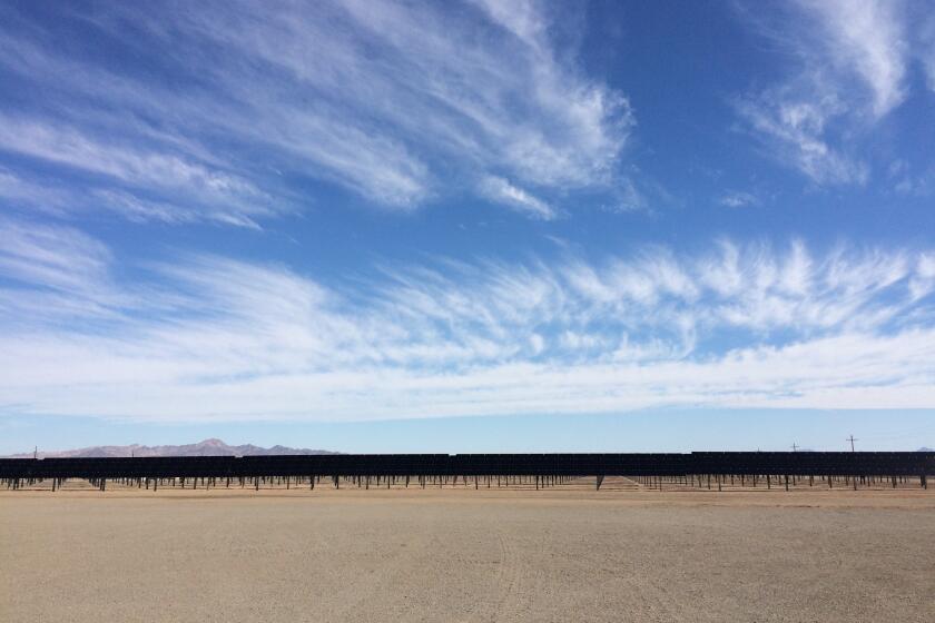 Solar panels tilt toward the sun at NextEra Energy's Blythe and McCoy solar farm in Riverside County, California, on Nov. 10, 2016.