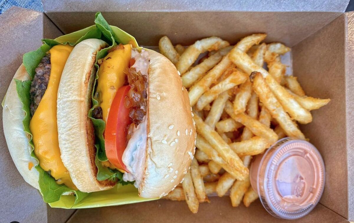 Underground Burgers' plant-based burgers and fries in North Park.