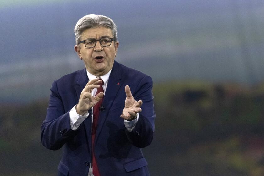 FILE - French Far-left presidential candidate for the 2022 election Jean-Luc Melenchon gestures as he speaks during a meeting in Nantes, western France, Sunday, Jan. 16, 2022. Jean-Luc Melenchon used to call Russia a "partner," even as European governments were scrambling to find ways to avert a Russian invasion of Ukraine. He now supports the Ukrainian's "resistance" and Russians who are opposing the war and fighting "dictatorship" in their own country. (AP Photo/Jeremias Gonzalez, File)