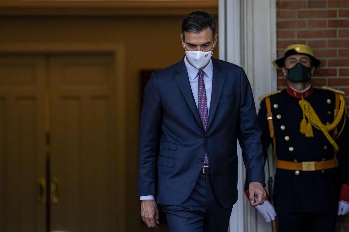 Spanish Prime Minister Pedro Sanchez walks prior to his meeting with Chilean President Sebastian Pinera at the Moncloa palace in Madrid, Spain, Tuesday, Sept. 7, 2021. (AP Photo/Manu Fernandez)