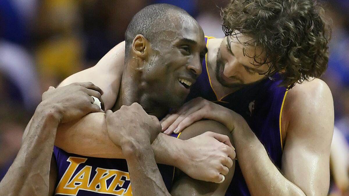 Kobe Bryant and Pau Gasol, right, celebrate in the closing seconds of the team's 2009 NBA championship win over Orlando.