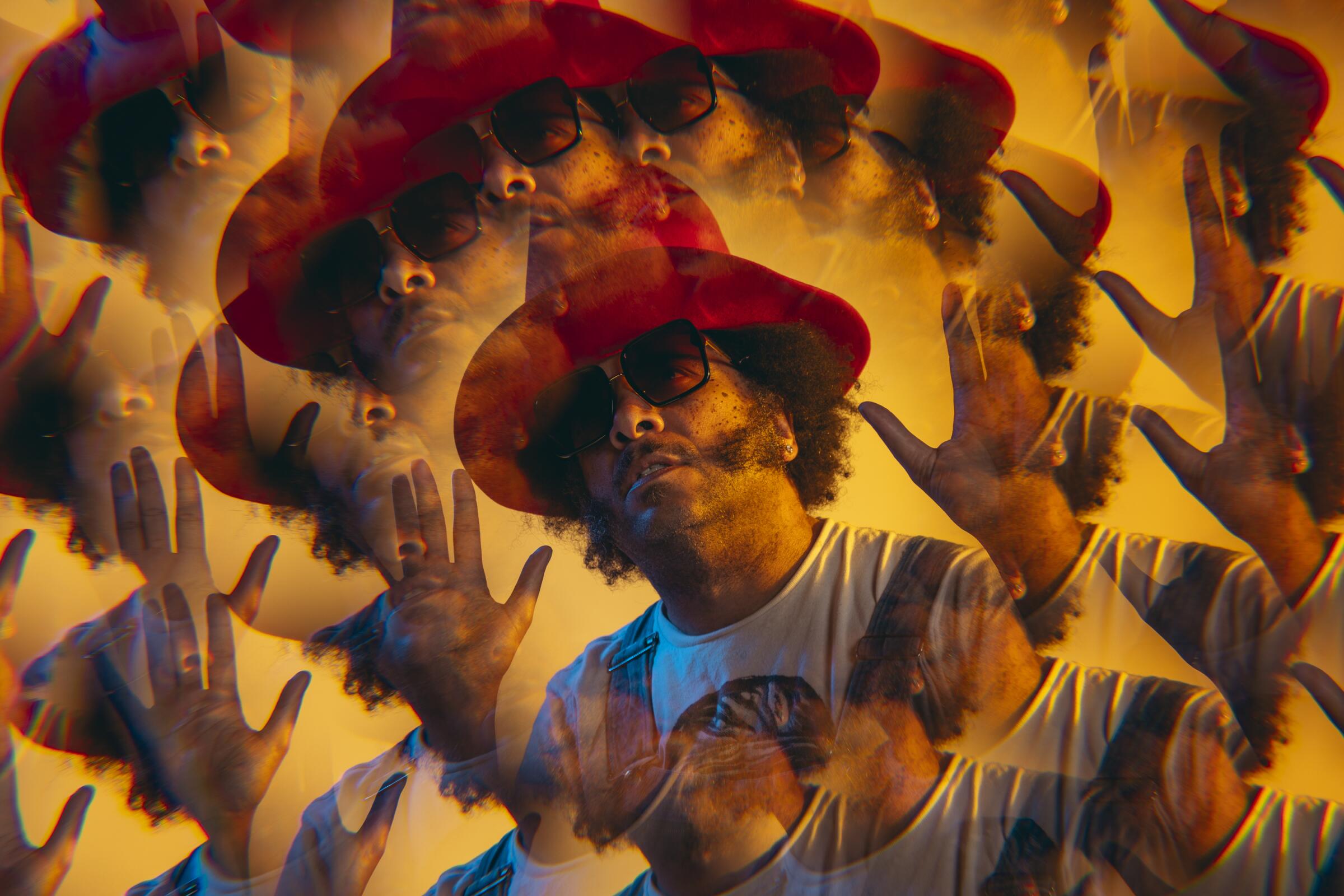 Boots Riley wears a large hat amid a swirl of his own image in a multiple-exposure portrait.