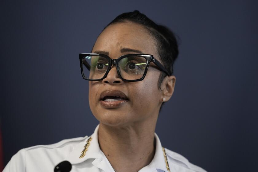 FILE - Philadelphia Police Commissioner Danielle Outlaw speaks with members of the media during a news conference in Philadelphia, Wednesday, Aug. 23, 2023. Outlaw will step down this month to take a leadership position with the Port Authority of New York and New Jersey, the mayor said Tuesday, Sept. 5. (AP Photo/Matt Rourke, File)