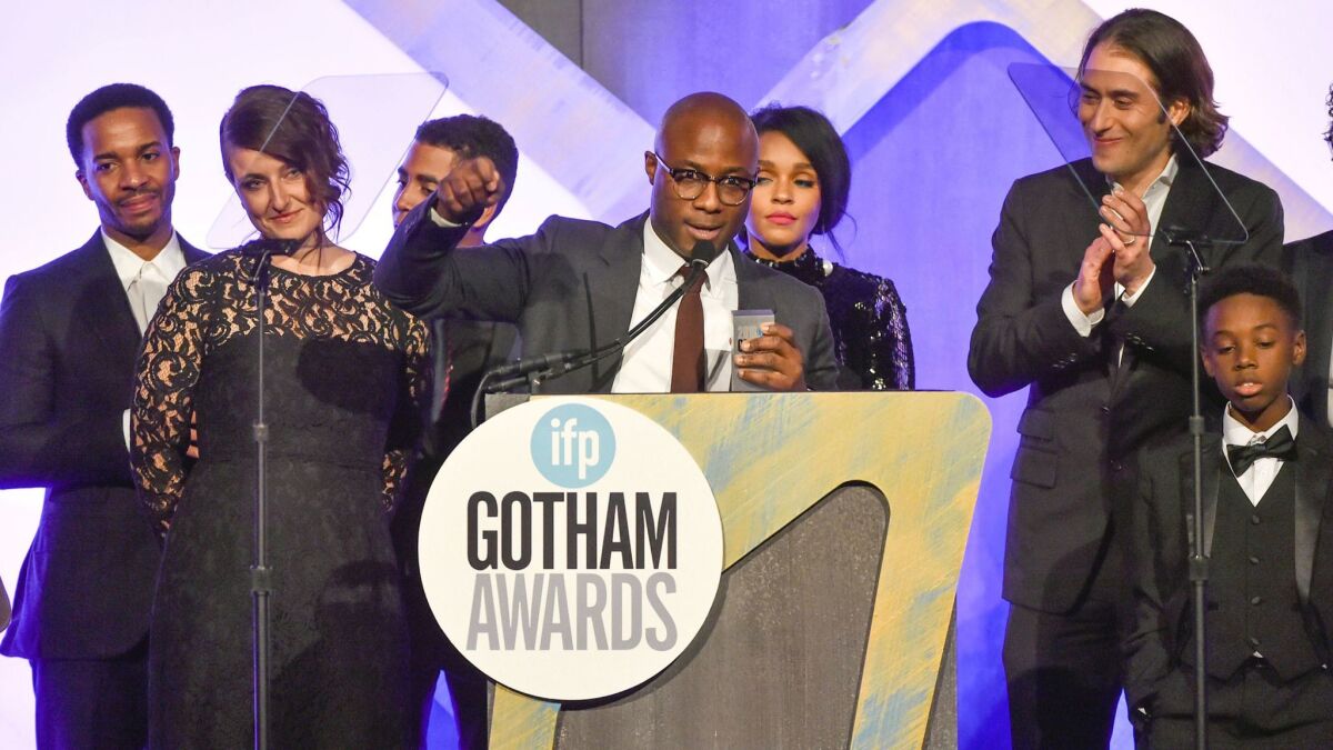 Writer-director Barry Jenkins accepts the best feature film award with the "Moonlight" cast Nov. 28 at the 26th Annual Gotham Independent Film Awards in New York.