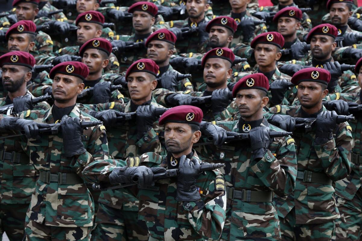 Soldiers of the Sri Lanka Army Commando Regiment's Maroon Berets march during a parade in Colombo, Sri Lanka, on Feb. 4.