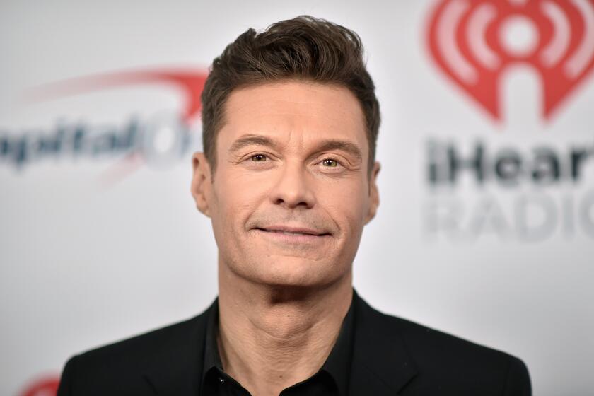 Ryan Seacrest arrives at the the 2021 Jingle Ball Los Angeles at the Forum on Friday, Dec. 3, 2021, in Inglewood, Calif. (Photo by Richard Shotwell/Invision/AP)