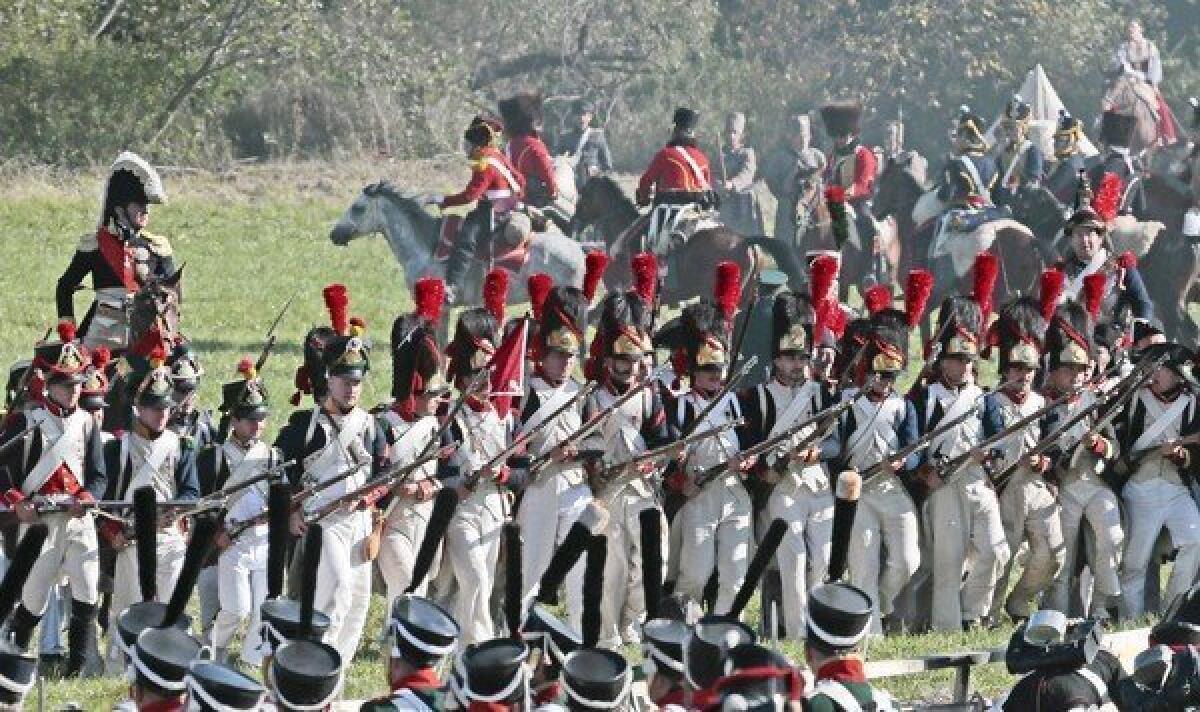 Historical reenactors rehearse at the site of the 1812 Battle of Borodino between Russian soldiers and French invaders. “Local officials are ready to sell this land without thinking of the legacy,” one critic said.