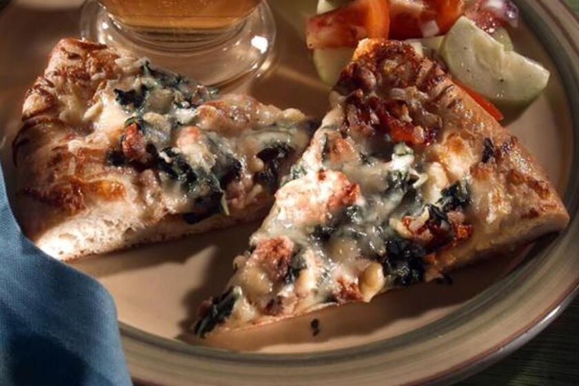 Recipe: Pizza With Smoked Chicken Sausage, Swiss Chard and Pine Nuts
