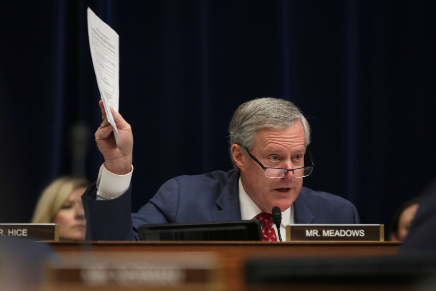Rep. Mark Meadows (R-NC) questions Michael Cohen as he testifies before the House Oversight Committee on Capitol Hill.