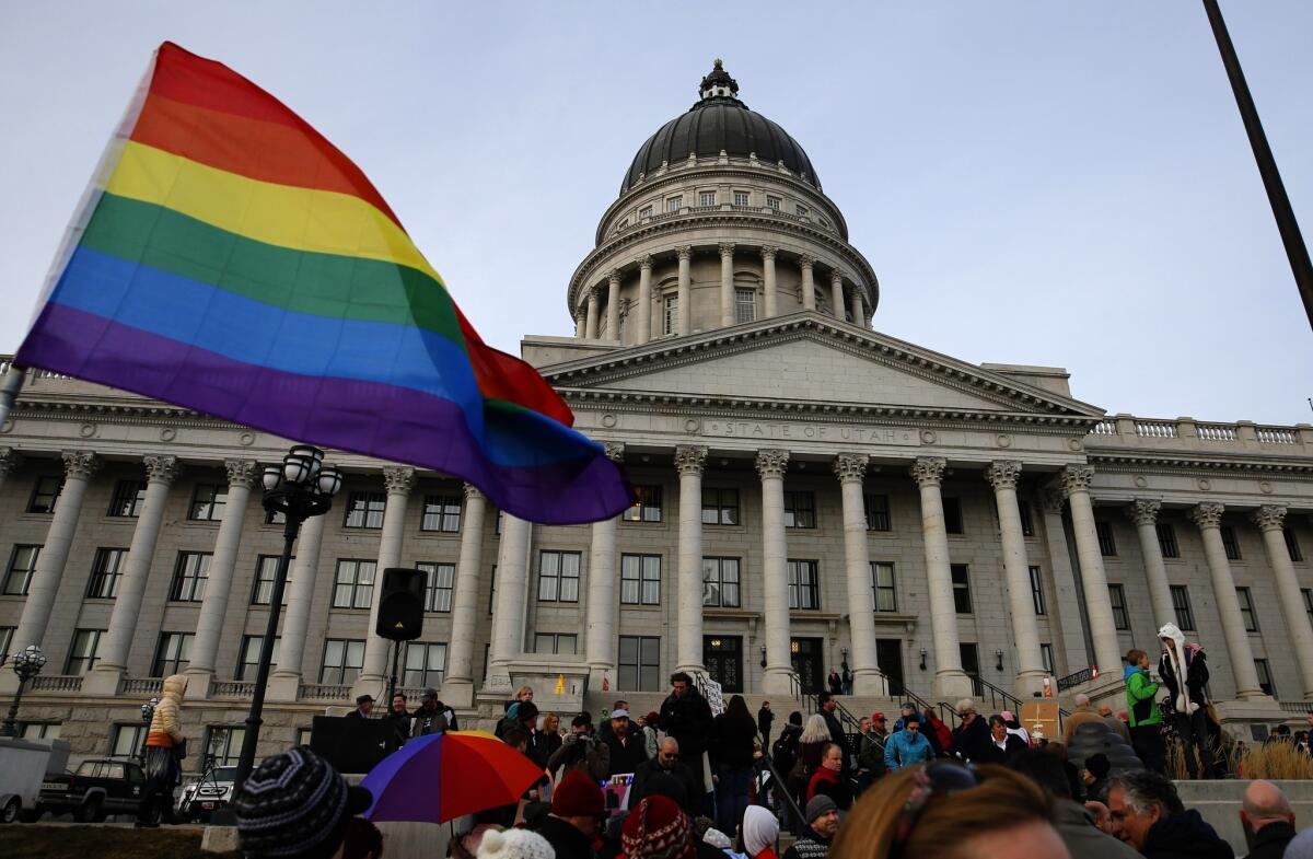 Supporters hold a pro-gay marriage rally outside the Utah State Capitol in Salt Lake City.