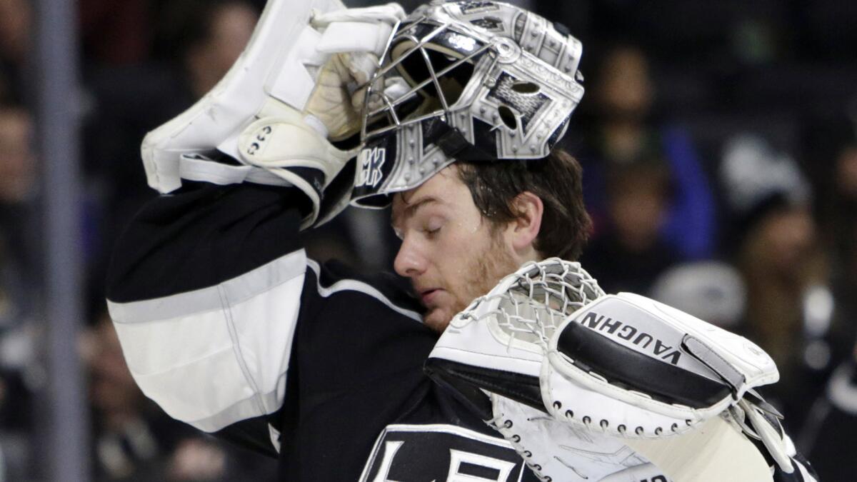 Kings goalie Jonathan Quick was pulled during the team's 7-6 overtime loss to the Nashville Predators on Saturday.