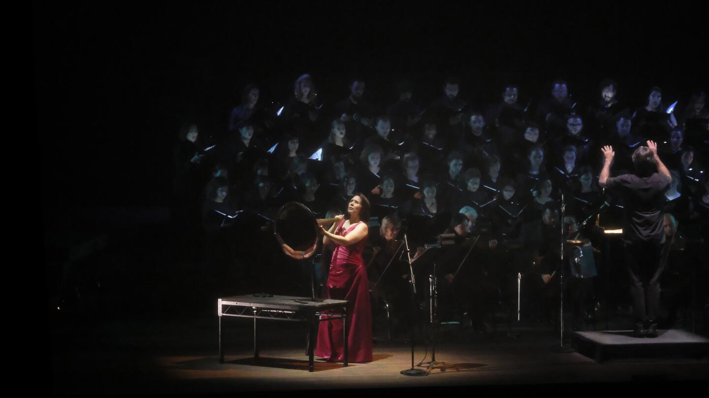 Soprano Jessica Rivera performs during the "Hubble Cantata" at the Ford Theatre in Los Angeles on Oct. 11, 2017. Paula Prestini's outer-space work‚ presented by the Ford Theatres and L.A Opera, is being touted as immersive opera, part science experiment and part virtual reality hoedown.