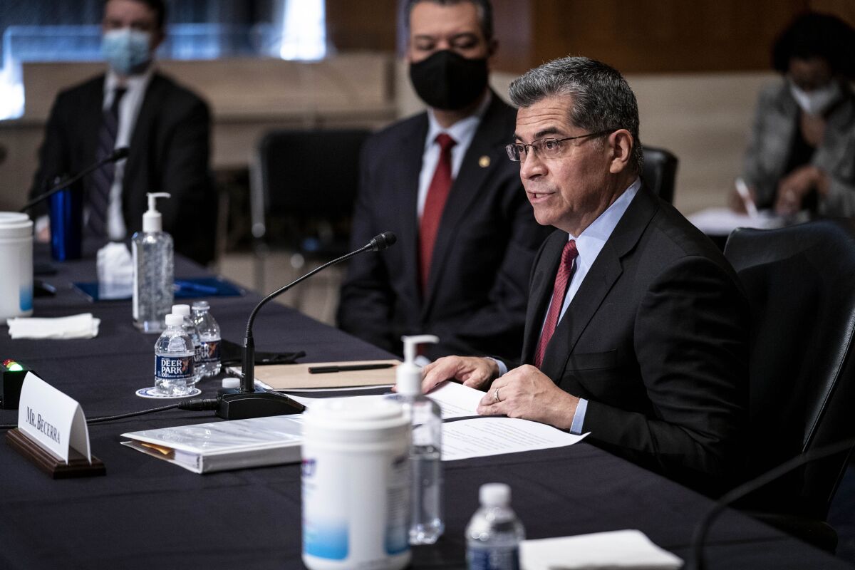 Xavier Becerra speaks at a Senate committee hearing on his nomination