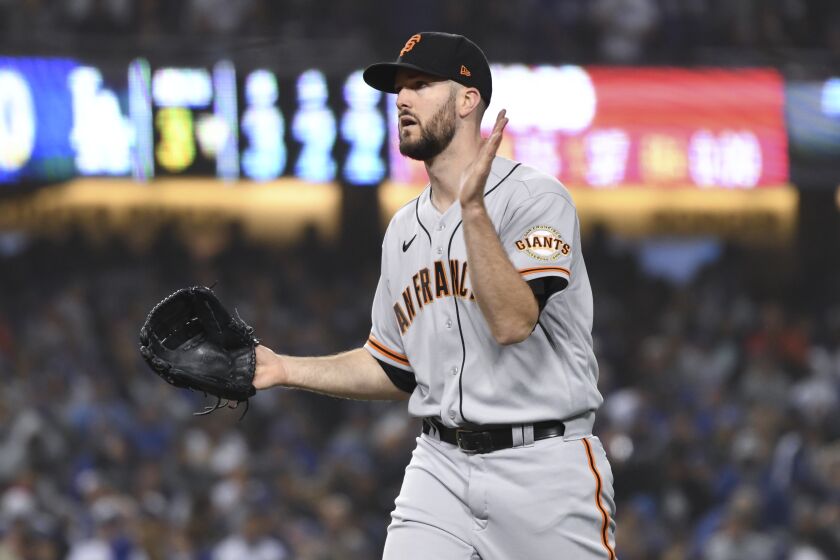 Los Angeles, CA - October 11: San Francisco Giants starting pitcher Alex Wood reacts after retiring the side during the third inning in game three of the 2021 National League Division Series against the Los Angeles Dodgers at Dodger Stadium on Monday, Oct. 11, 2021 in Los Angeles, CA.(Wally Skalij / Los Angeles Times)