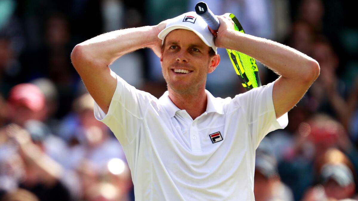 Sam Querrey reacts after defeating Novak Djokovic in the third round at Wimbledon in 2016.