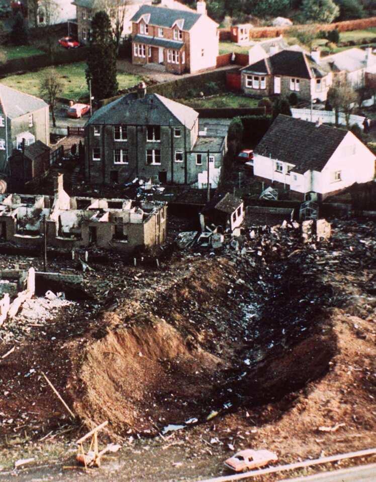 The explosion of Pan Am Flight 103 left burned-out houses and a huge crater near Lockerbie, Scotland, in December 1988.