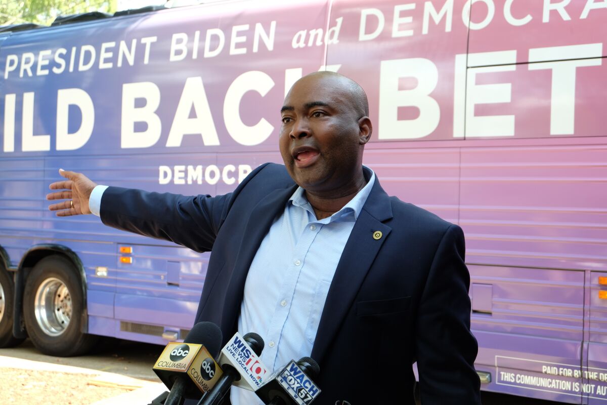 FILE - Democratic National Committee Chair Jaime Harrison speaks with reporters outside the South Carolina Democratic Party headquarters in Columbia, S.C., Aug. 13, 2021. Democratic National Committee members have begun to grumble about Harrison’s limited engagement with the rank-and-file, while others believe the White House isn't giving him the freedom he needs to do the job well. Some allies worry aloud that Biden's team hasn't let Harrison select the members he wants, hire his preferred staff, or drive the party's messaging. (AP Photo/Michelle Liu, File)