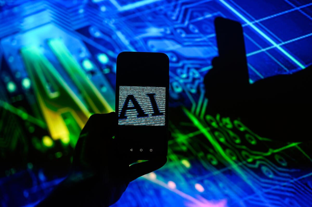 An AI logo is displayed on a smartphone 