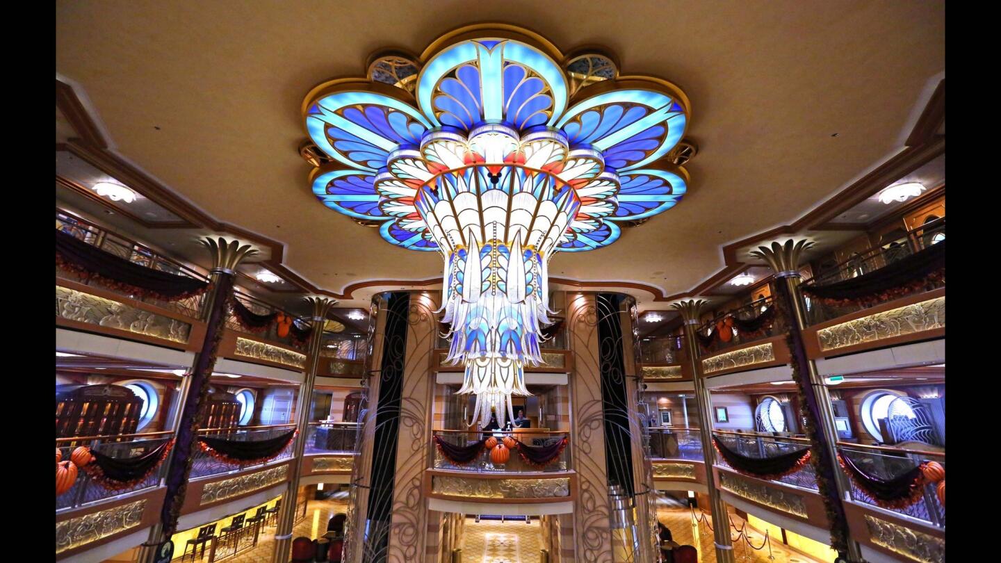 A view of the main atrium onboard the Disney Dream, as Disney Cruise Lines unveiled the new enhancements to the ship, Friday, Oct. 30, 2015, which set sail for the Bahamas Friday night. A media preview of the ship's new features included the re-imagined Oceaneer Club offering new play areas for children ages 3 to 12, showcasing the interactive replica of the Millennium Falcon and a high-tech playground based on the 'Disney Infinity' video game. Other enhancements include a new treats shop, Vanellope's Sweets & Treats, and a new adults quiet area called Satellite Falls. (Joe Burbank/Orlando Sentinel)