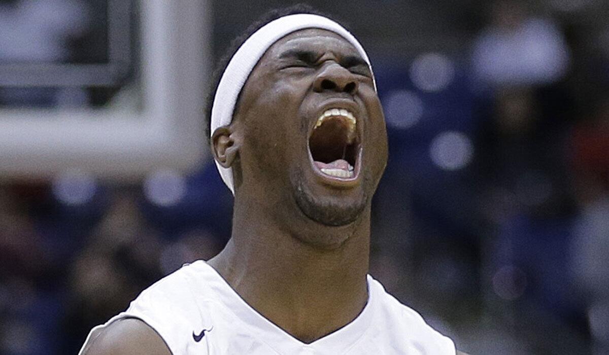 Soso Jamabo reacts while playing for Plano (Texas) West High in the UIL boys' 6A basketball state finals in March.