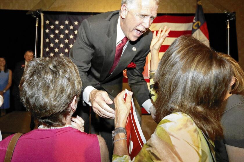 Thom Tillis greets supporters Tuesday after winning the GOP nomination to challenge North Carolina Sen. Kay Hagan.