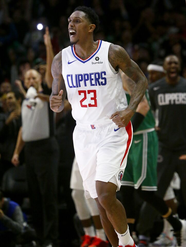 Clippers guard Lou Williams celebrates after hitting a three-pointer against the Celtics late in the fourth quarter of a game Nov. 20 at Staples Center.