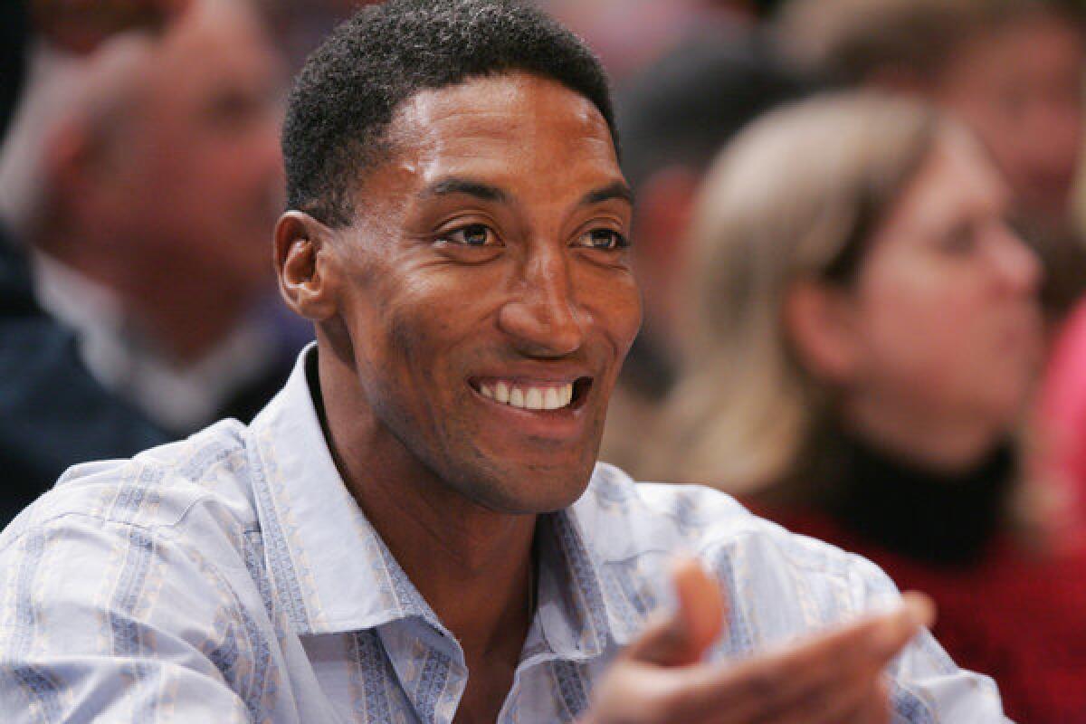 Former Chicago Bulls player Scottie Pippen cheers on from his seat during a game against the New York Knicks. Witnesses said that a fight occurred between Pippen and an intoxicated man at Nobu Malibu, deputies say.