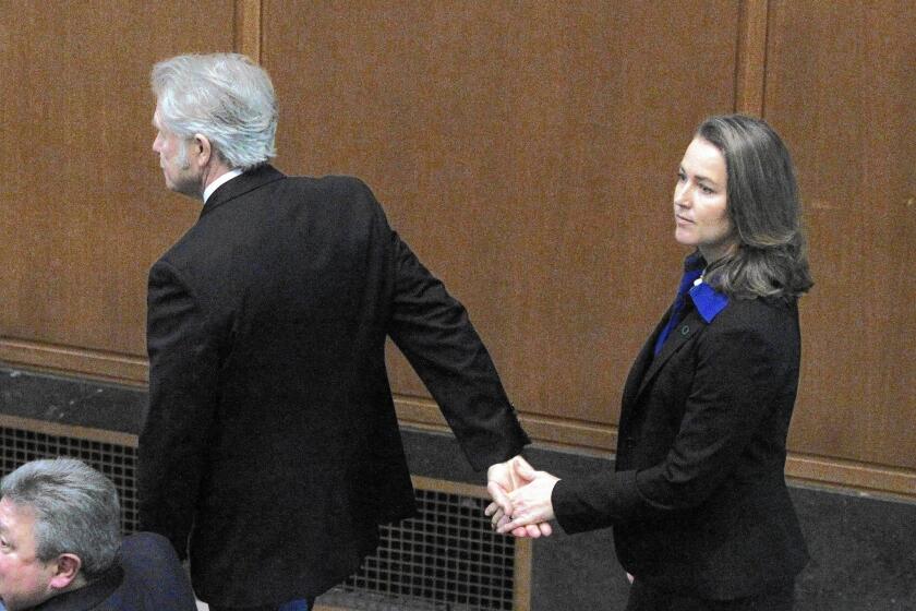 Oregon Gov. John Kitzhaber and fiancee Cylvia Hayes before his swearing-in last month in Salem for a fourth term.