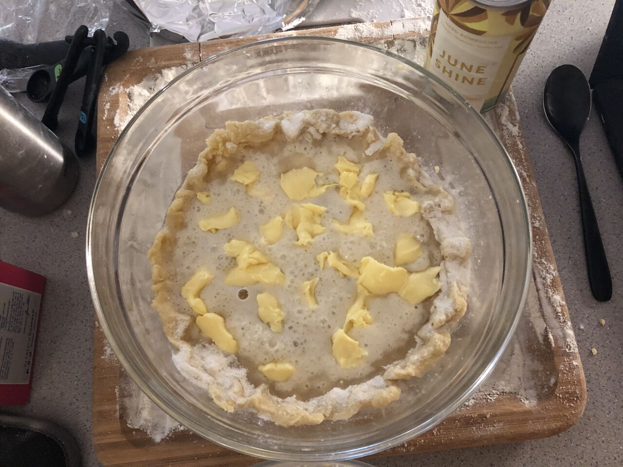The pie sprinkled with pieces of grated butter. Admittedly, the butter is more mushed than grated, since I accidentally left the butter out after making the pie crust.