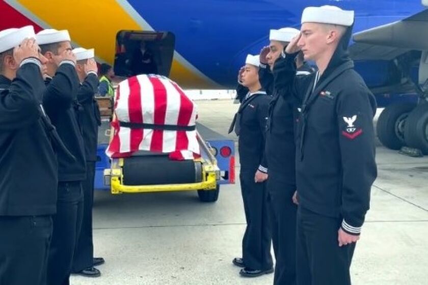 On Dec. 1, a casket bearing the recently identified remains of WW II sailor Daniel Harris arrived here for burial on Dec. 7.