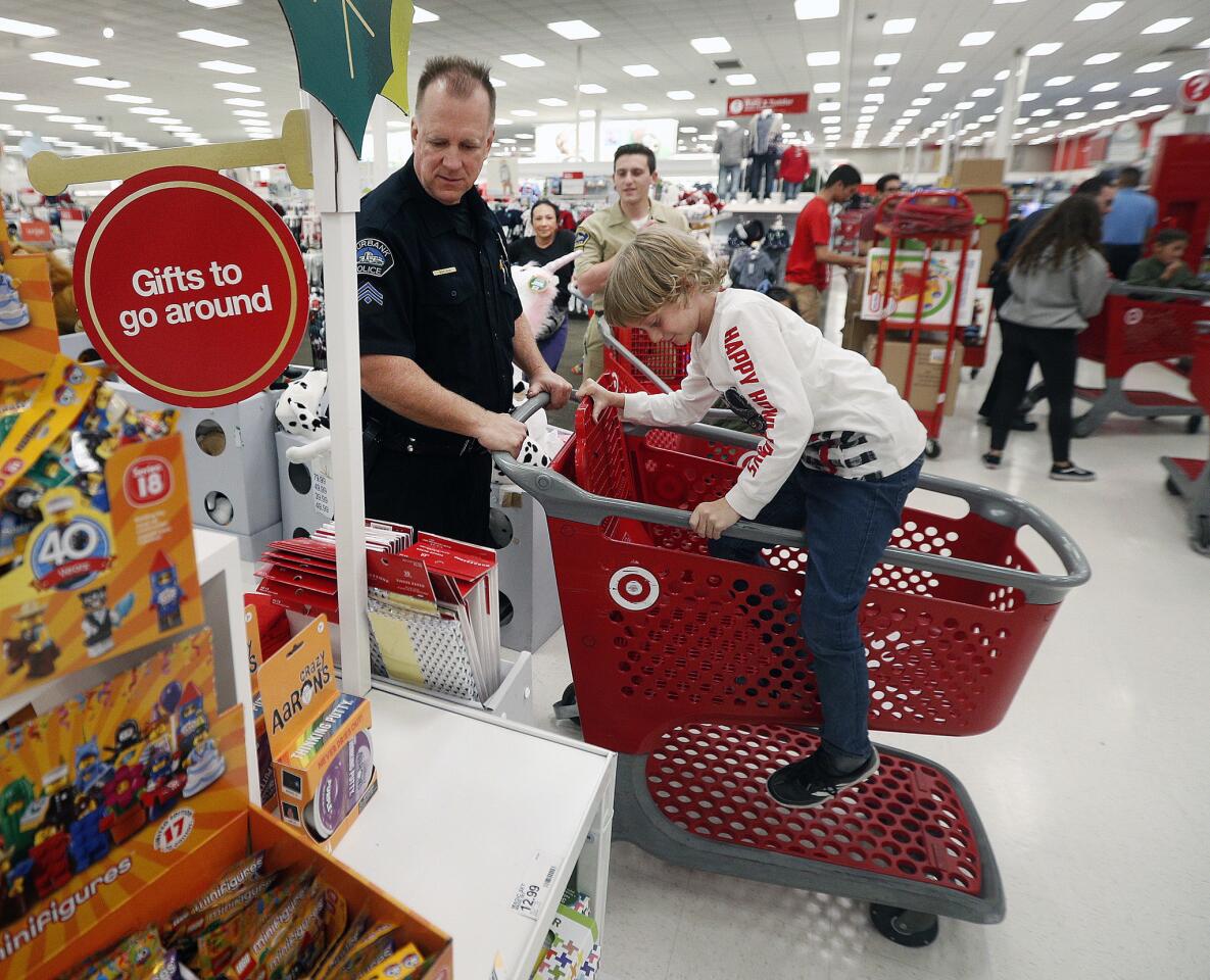 Photo Gallery: Burbank Boys and Girls Club children match up with Burbank Police Department for annual Heroes and Helpers event