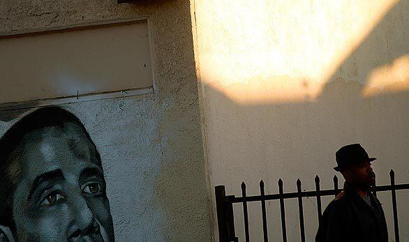 A likeness of President Barack Obama gazes down along Martin Luther King Jr. Boulevard in Compton on Inauguration Day.
