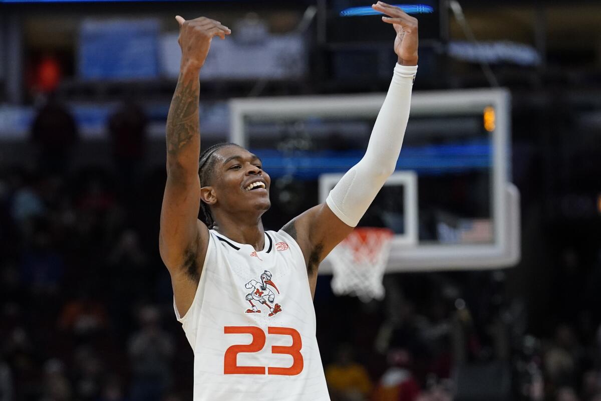 Miami's Kameron McGusty reacts after the Hurricanes' Sweet 16 win March 25, 2022.