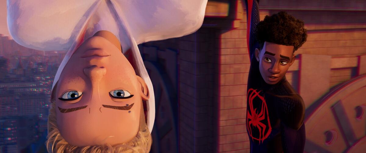 Animated shot of Gwen Stacy in white super suit, hanging upside down as Miles Morales hangs nearby in black suit.